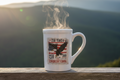 250th Anniversary Mug as Focal Point on Rustic Mountain Fence