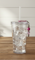 Glittery Beaded Straw Charm on Tumbler with Clear Liquid in Farmhouse Kitchen