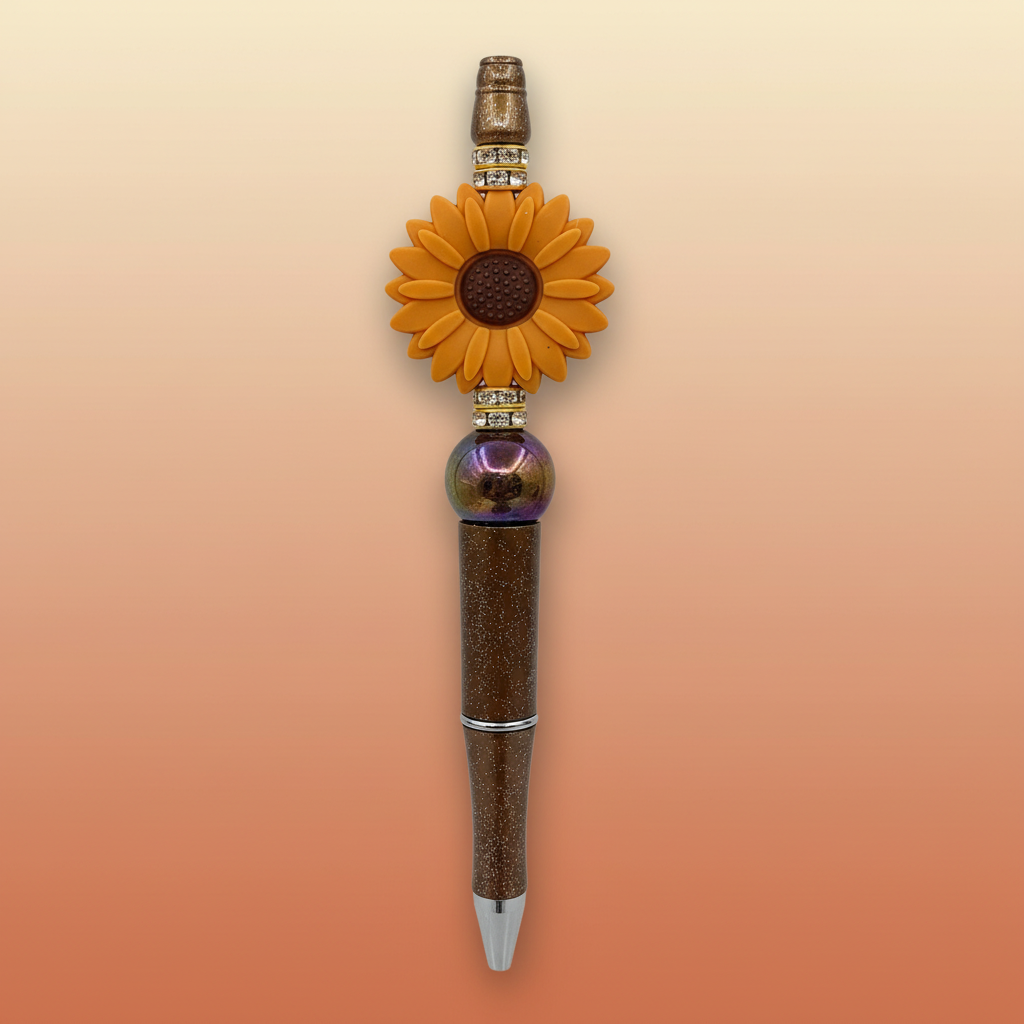 Terracotta-orange flower beaded pen clean product shot