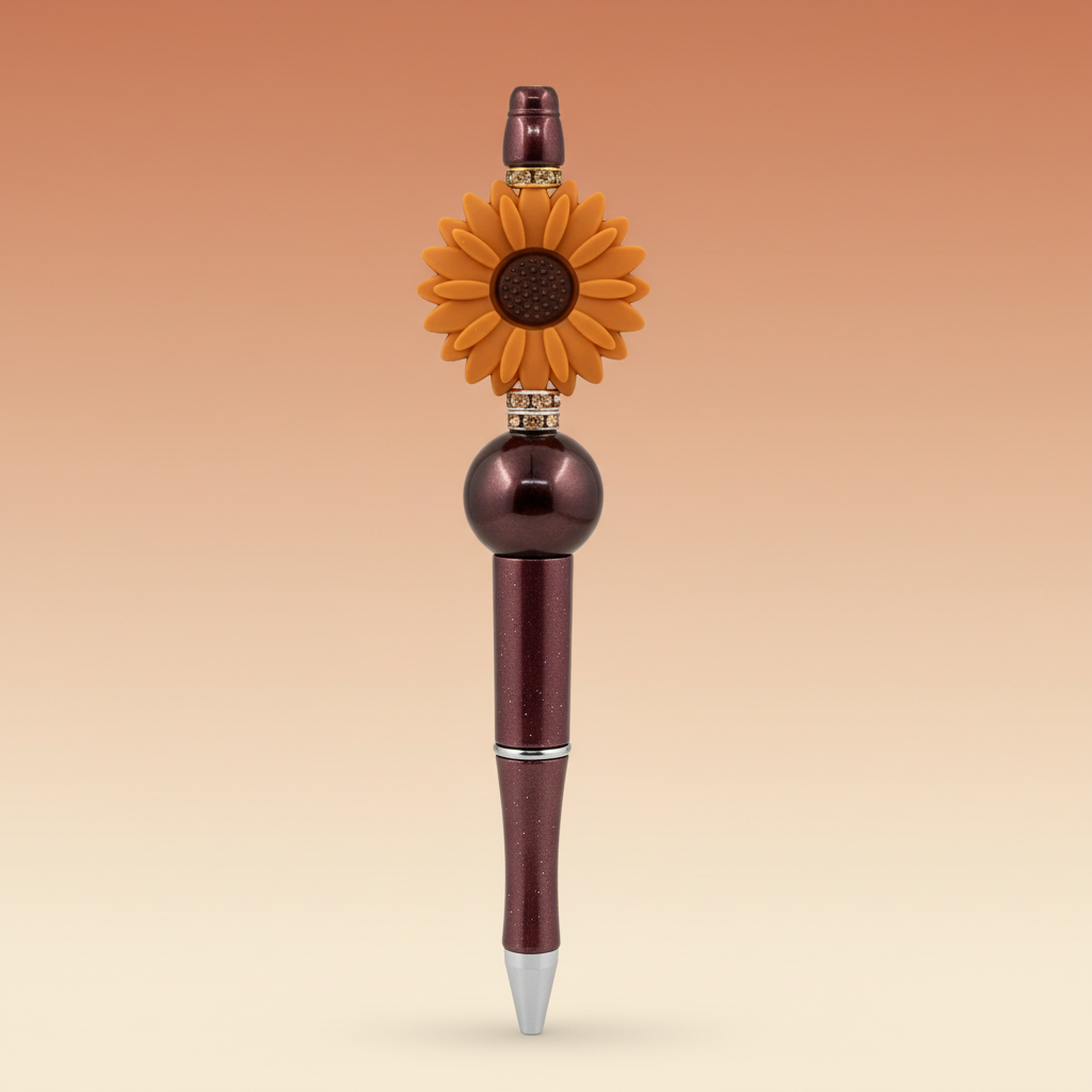Terracotta-orange flower beaded pen clean product shot