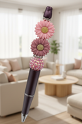 Pink and mauve flowers beaded pen in bright living room setting
