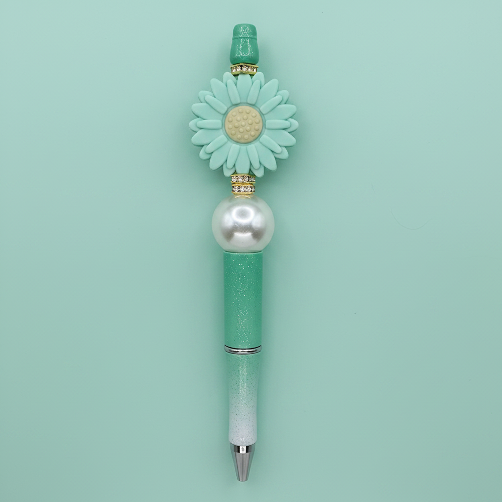 Seafoam green flower beaded pen clean product shot