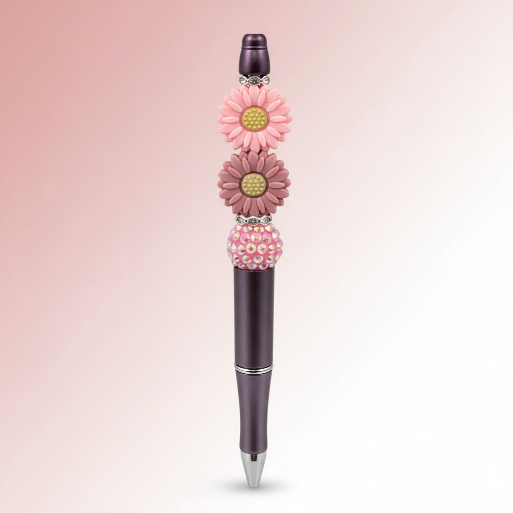 Pink and mauve flowers beaded pen clean product shot