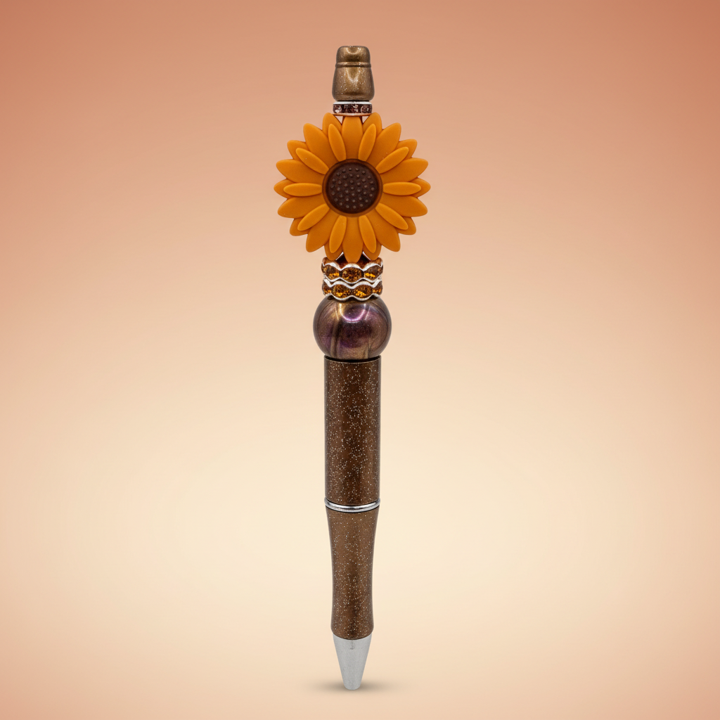 Terracotta-orange flower beaded pen clean product shot