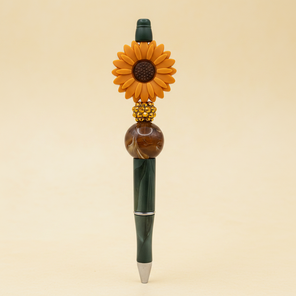 Terracotta-orange flower beaded pen clean product shot