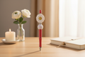 White flower beaded pen in a cozy elegant home setting