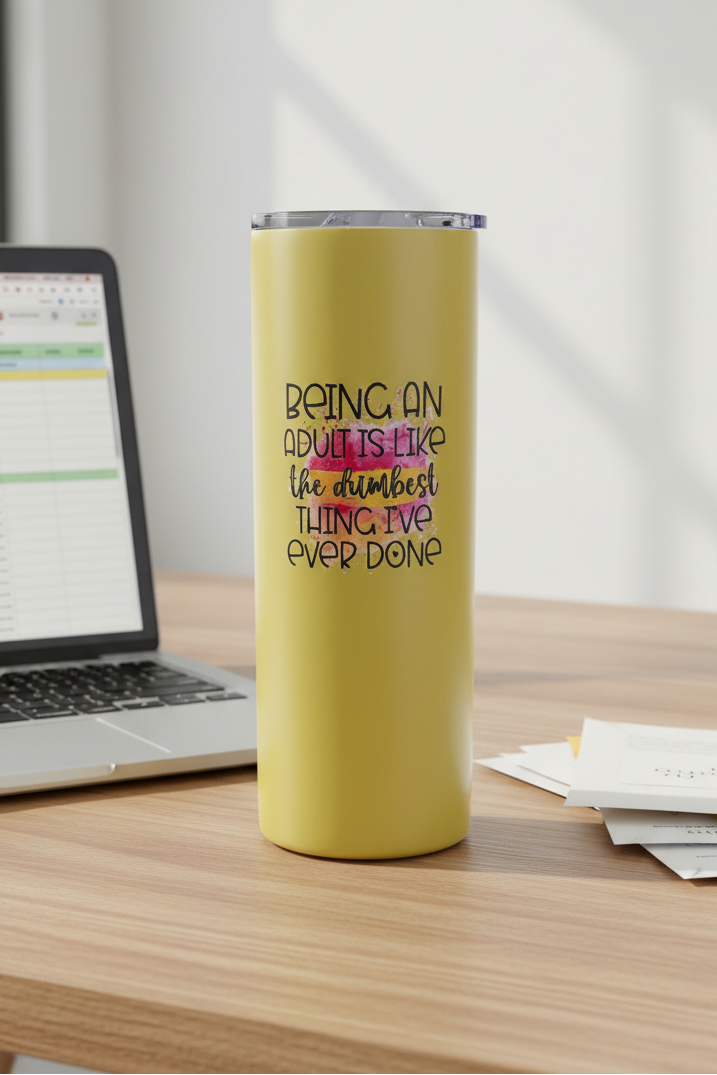 Tumbler with Computer and Bills