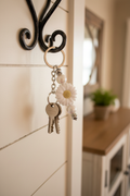 White Sunflower Keychain Hanging on Hook